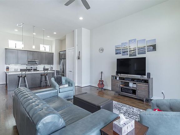 Another view of the living room towards the kitchen.