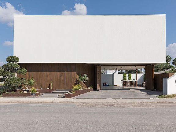 Car garage with bifold doors
