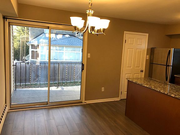 Dining Room - Sliding Door to Balcony and Backyard; Open-Concept to Kitchen