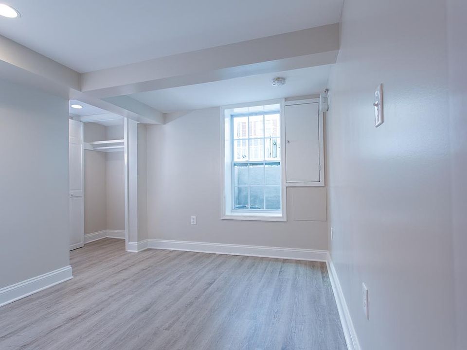 Bedroom with lots of natural light, closet and a blackout shade