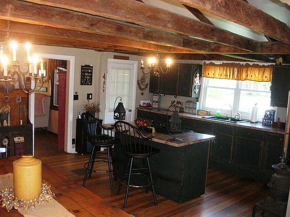 exposed beams, wood floors