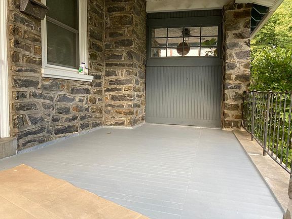 Front porch. Room for a bench, table, and chairs.