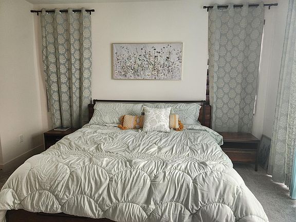 master bedroom with backyard entry