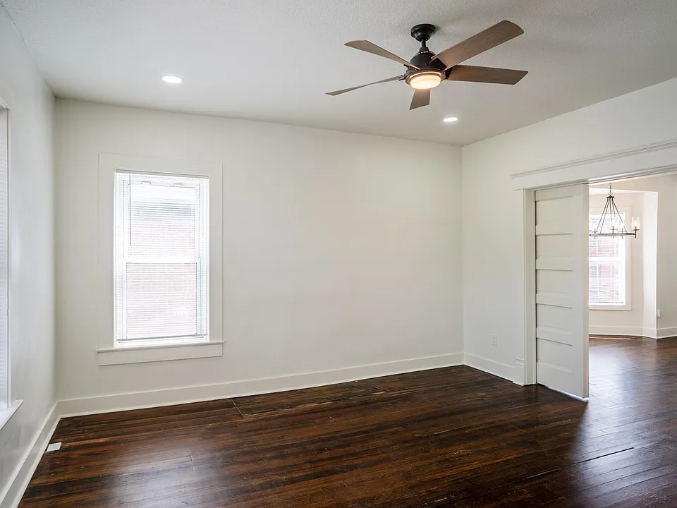 Living Room w/ original pocket doors