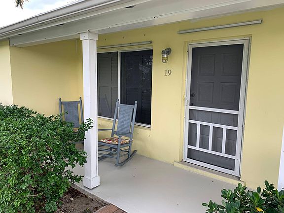front porch with rocking chairs