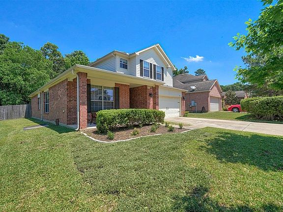 Enjoy sitting outside with this charming front porch !