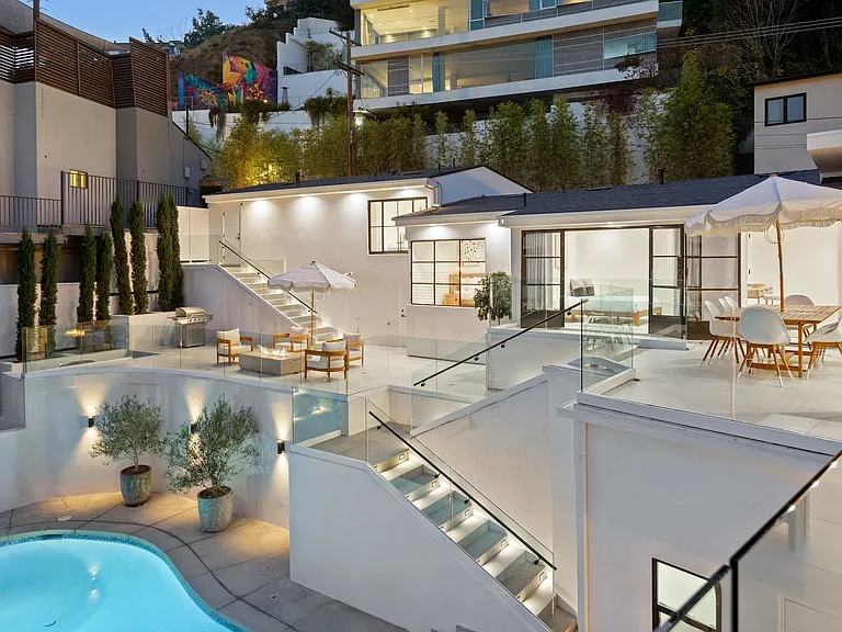 Elevate your stay with multi-level terraces and sweeping hillside views.