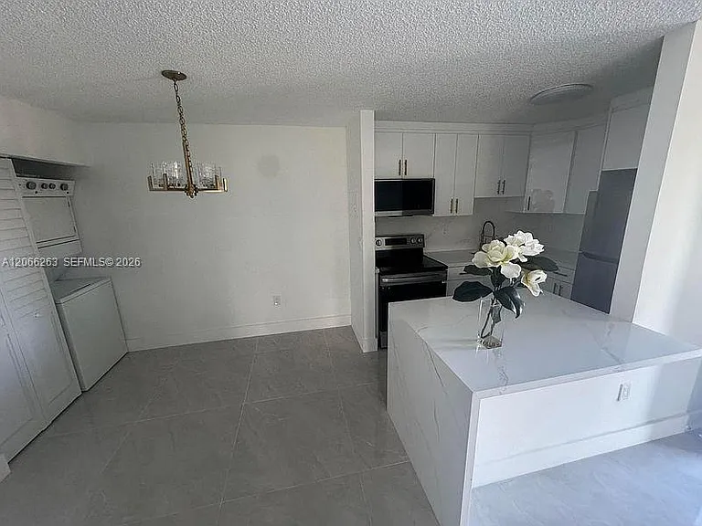 7195 NW 179th St #107 — Photo 9