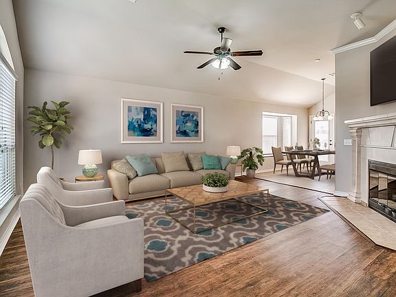 Spacious Living Room with Easy Care Plank Flooring