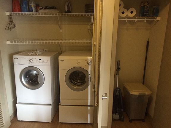 Laundry area and adjacent closet.