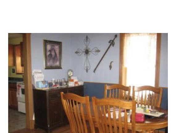 Formal dining room on main floor. Large windows on 2 walls.