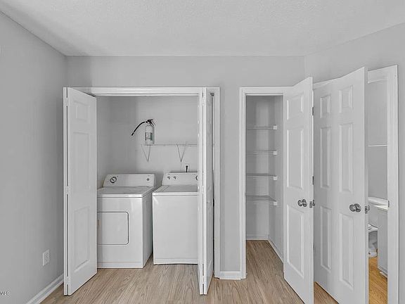 Pantry, half bath and laundry area.