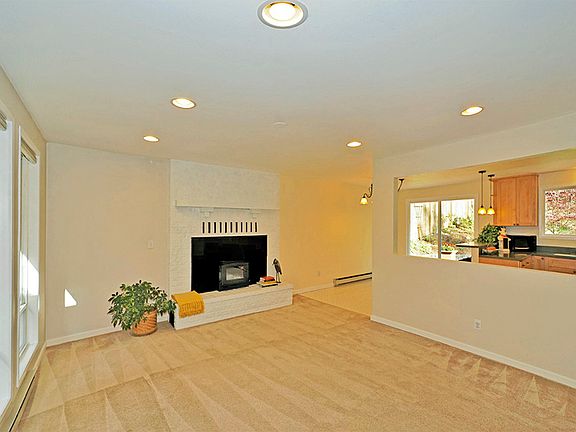 The living room opens into the kitchen and breakfast nook area.