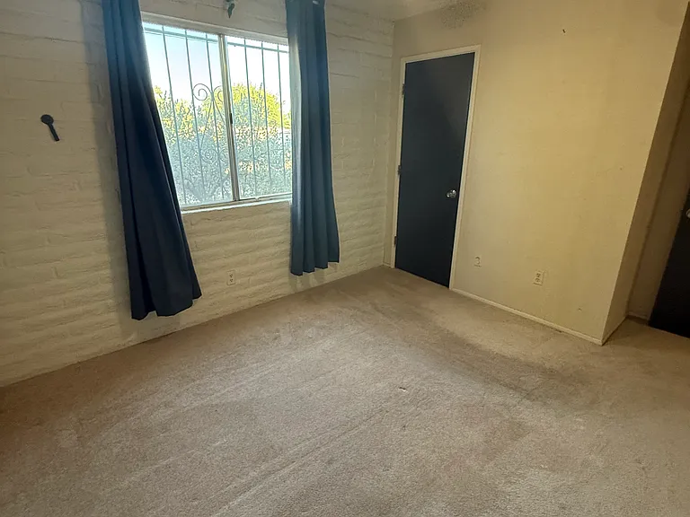 Third bedroom also has a dimmable ceiling fan with remote and thermal curtains to reduce energy costs.