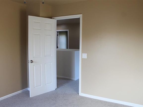 This spacious study is located on the second floor with easy access to downstairs or the upstairs game room.