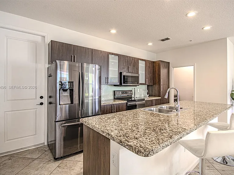 1430 NW 48th Dr — Photo 25