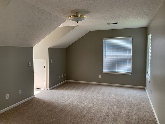 Spacious bonus room with loads of natural light