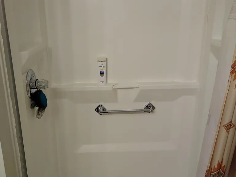 Oversized shower with grab bars