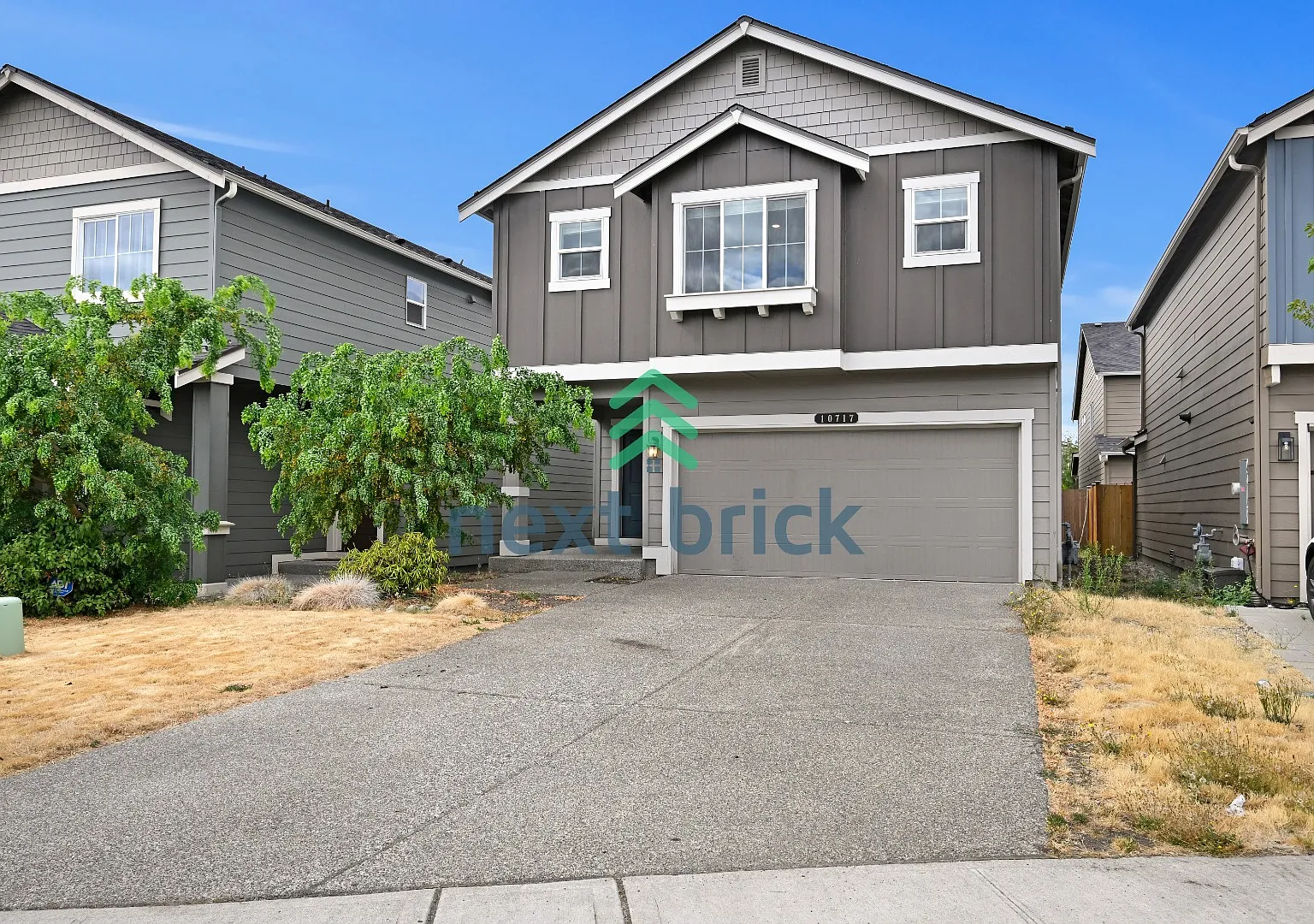 "Charming 4-Bedroom Home in Puyallup with Spacious 1831 Sq Ft Layout & 2.5 Baths!" — Photo 2