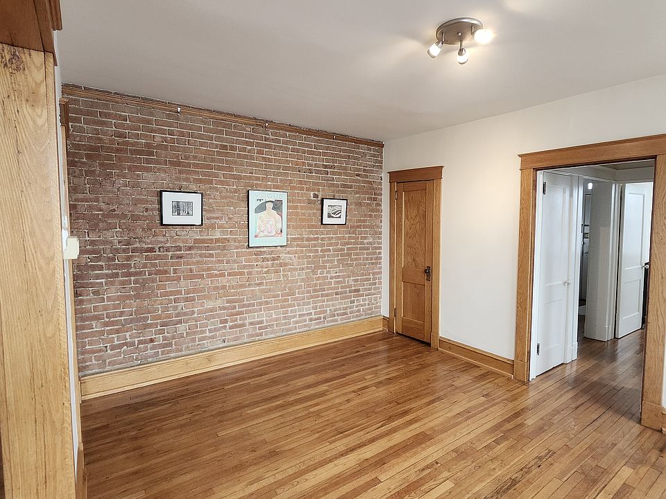 Dining room with exposed brick