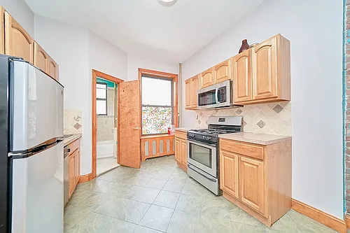501 1/2 W 43rd St #3E Photo 1