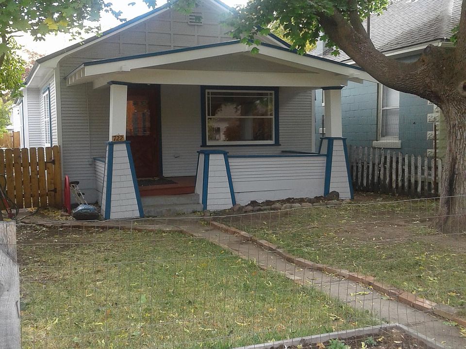 Lovely porch with a large maple tree to shade in summer and