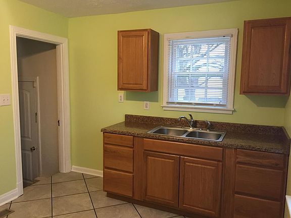 Basement access through kitchen.