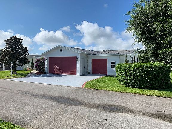 Front with attached garages.