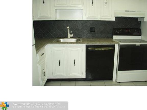2nd image of 2651 S Palm Aire Dr APT 104