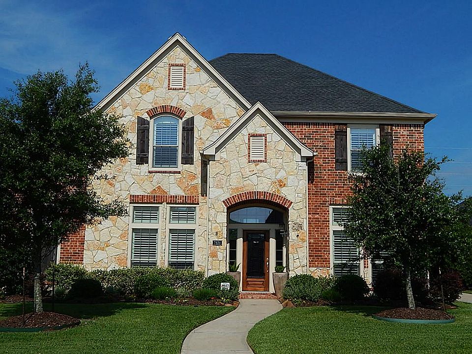 Come Home to this gorgeous home at 7406 Rain Drop Court located on a quiet cul de sac.