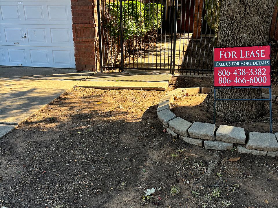 Front entrance with privacy fence.