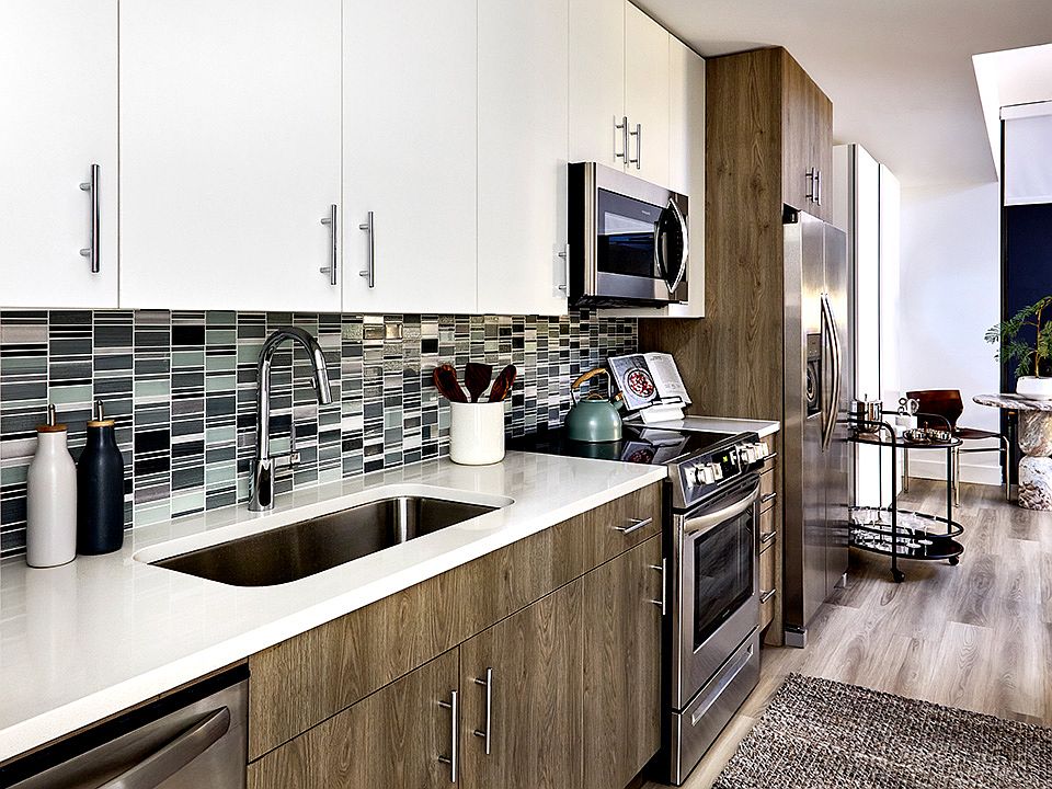 Kitchen with Stainless Steel Appliances and Quartz Countertops