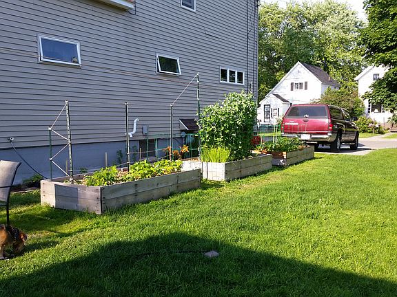 Flowers beds along side hse