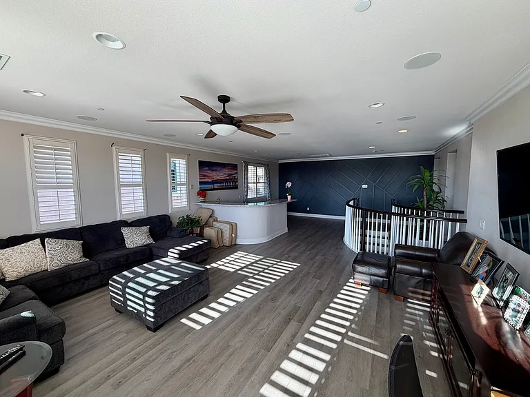 family room loft space with upstairs deck access