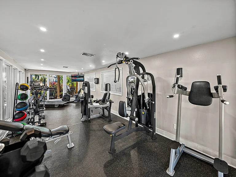 Spacious community fitness center with strength and cardio equipment
