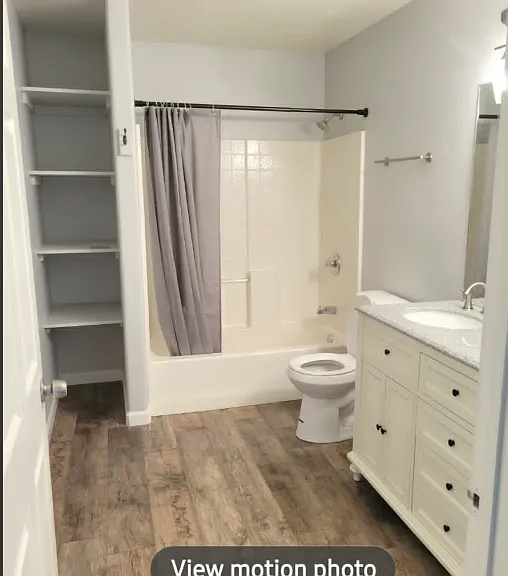 Pocket door into masterbed room is on the left wall, across from vanity