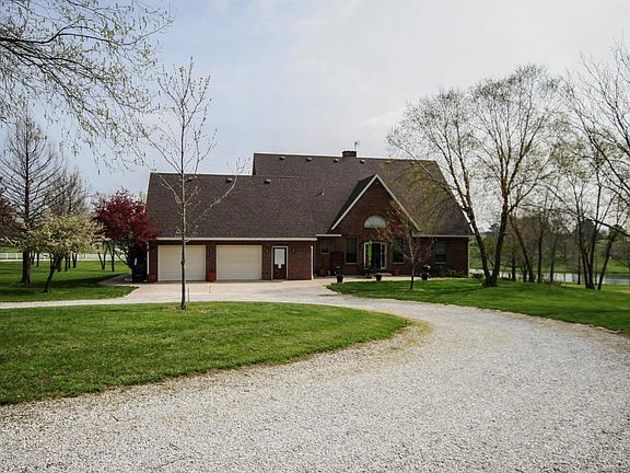 Rear view with 2 car garage