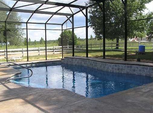 Screened Heated Pool with Recessed Solar Cover