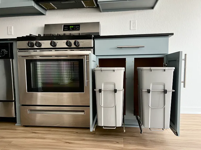 New oven and built in trash/recycling pullouts.