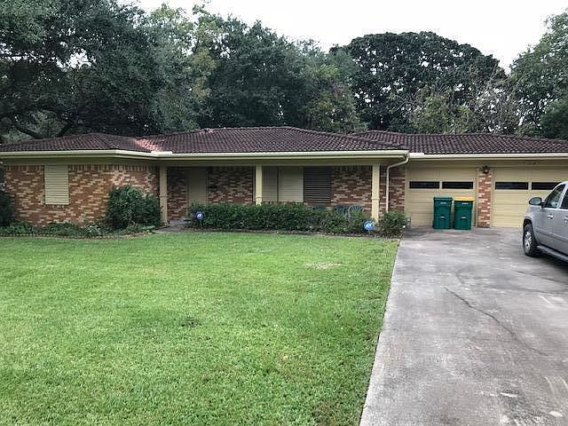 Large front and back yard with lots of shade trees!