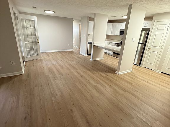 New flooring throughout the space and plenty of room for entertaining/family space.