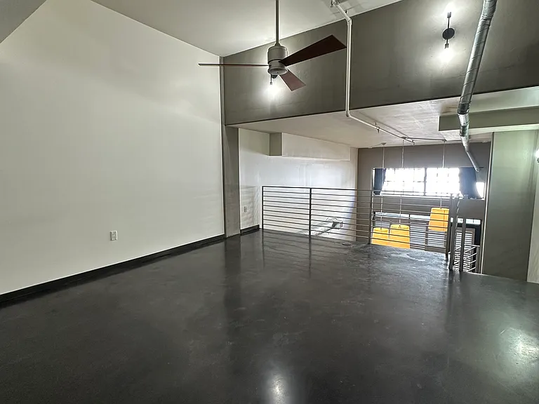 Loft level bedroom space.