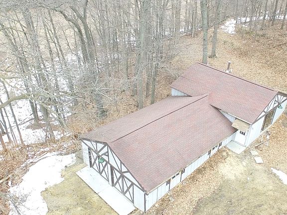 House located on bluff overlooking lake