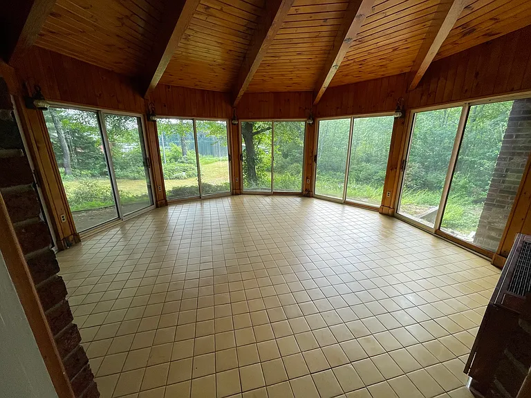 Sunroom overlooking pond
