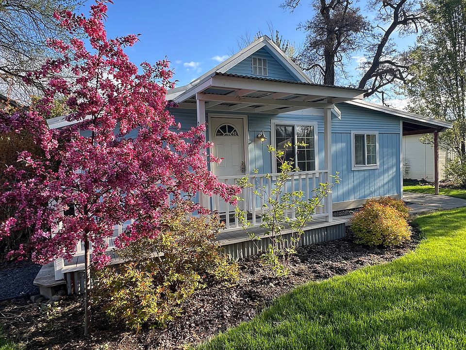 Spring is here!! front covered porch. All lawn & garden car tended by Landlord.