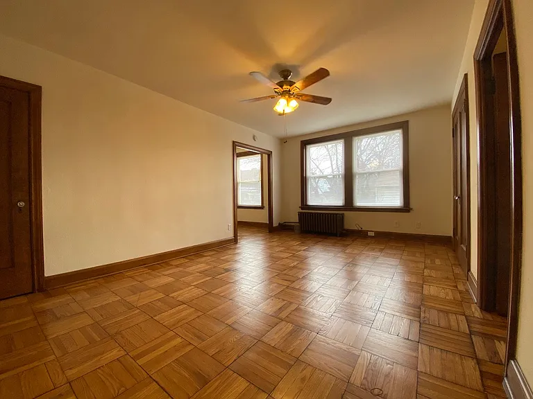 From another angle, you can see the entryway into the dinette space and kitchen.