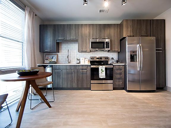 Kitchen with plenty of storage, energy efficient appliances, all stainless steel.
