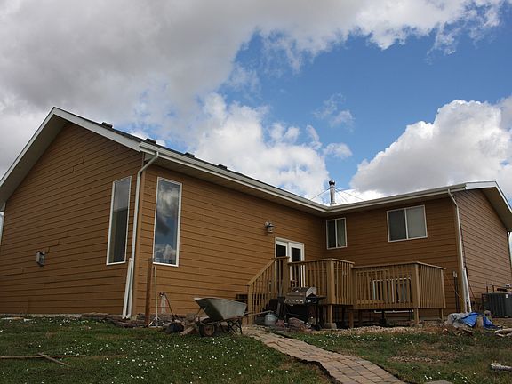 Back of house. Yard view.