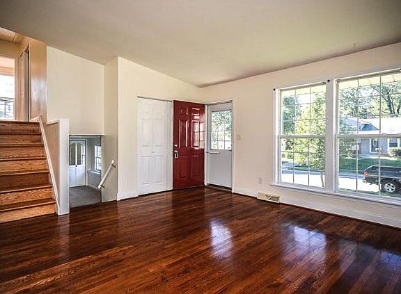Gleaming hardwd floors & soaring ceiling in Liv Rm
