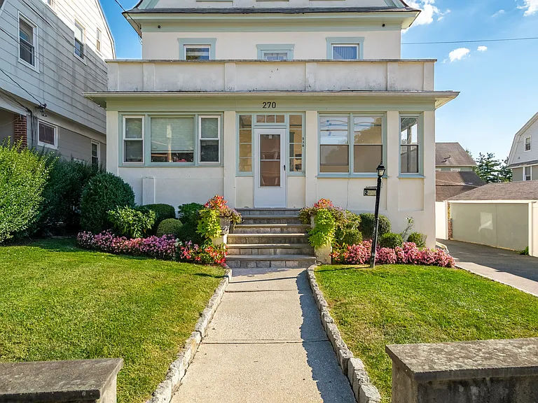 Front of home, walkway & garden.